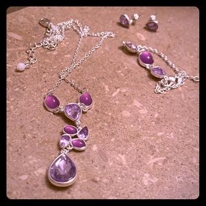 purple necklace, bracelet,and pair of earrings set